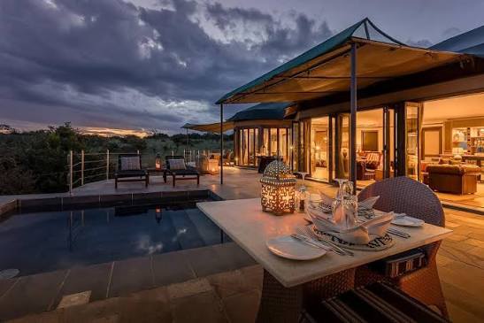 Private sunset dinner beside a pool