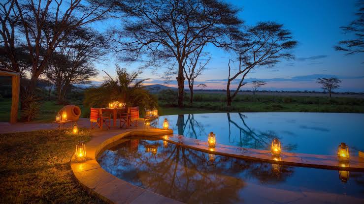 Wildlife crossing a Kenyan savannah